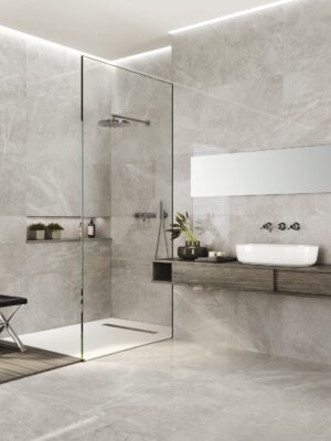 bathroom scene with a 24x48 polished tile in light gray color