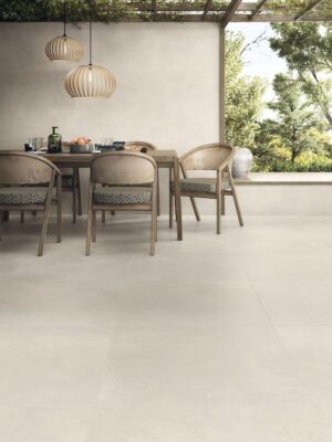 Dining room with light beige color industrial tile that has minimal design for a contemporary look