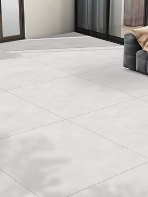 a patio with a light color with 48x48 concrete look tile in light earth tones