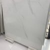 white marble Carrara look tile on showroom display