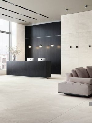 an interior with light color 48x48 porcelain tile on the floor and walls