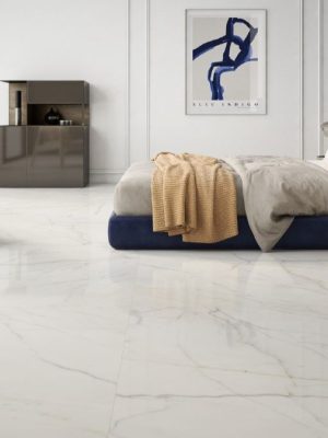 bedroom picture with matte finish white tile that has gold and bluish veining.