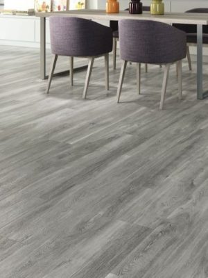 open concept kitchen with gray color wood looking tile