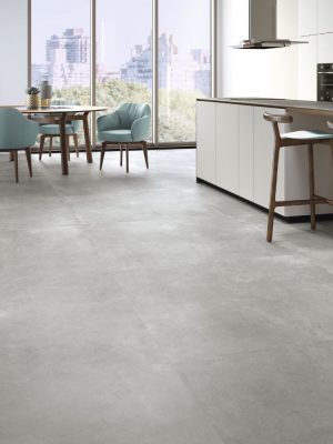 Modern living room with large porcelain tiles and minimal grout lines.
