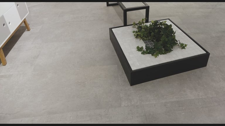 a boutique floor with Atelier Ash, concrete look, large format tile