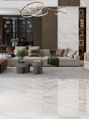 A modern and elegant living room with Calcutta Gold polished 63x63 tile on the floor an on a remarkable accent wall.