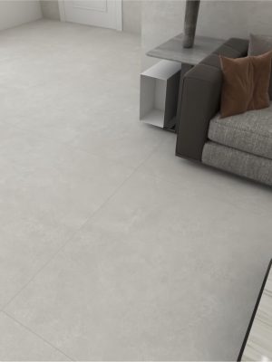 a living room with light gray color concrete look tile