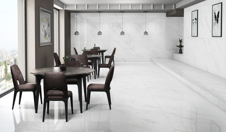 A living room with 48x48 floor tiles in whit color and subtle gray veining
